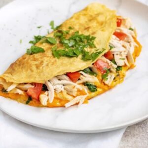 Chicken Tikka Omelette with  3 Eggs+ Toast+ Fries